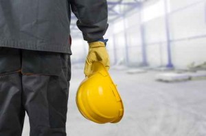 worker with helmet in production hall